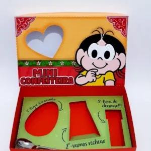 Imagem de decoração de festa/caixa Mini Confeiteiro da Turma da Mônica Magali com topper de orelhinhas de coelho. Arquivo digital Studio e PDF para festa de aniversário ou temas de Páscoa.